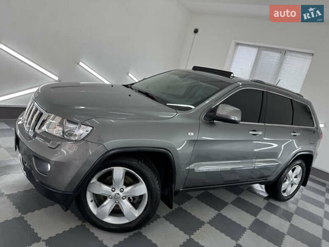 Сірий Джип Grand Cherokee, об'ємом двигуна 3 л та пробігом 164 тис. км за 18599 $, фото 103 на Automoto.ua
