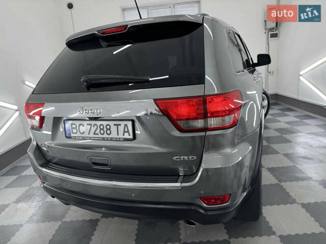Сірий Джип Grand Cherokee, об'ємом двигуна 3 л та пробігом 164 тис. км за 18599 $, фото 105 на Automoto.ua
