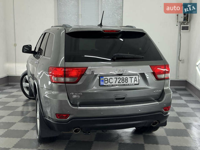 Сірий Джип Grand Cherokee, об'ємом двигуна 3 л та пробігом 164 тис. км за 18599 $, фото 136 на Automoto.ua