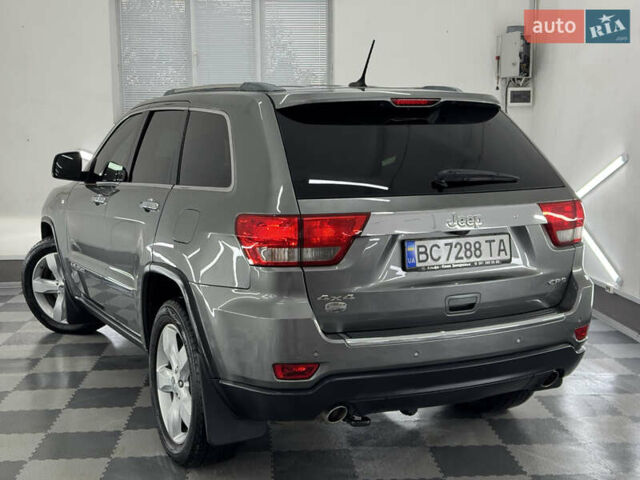 Сірий Джип Grand Cherokee, об'ємом двигуна 3 л та пробігом 164 тис. км за 18599 $, фото 135 на Automoto.ua