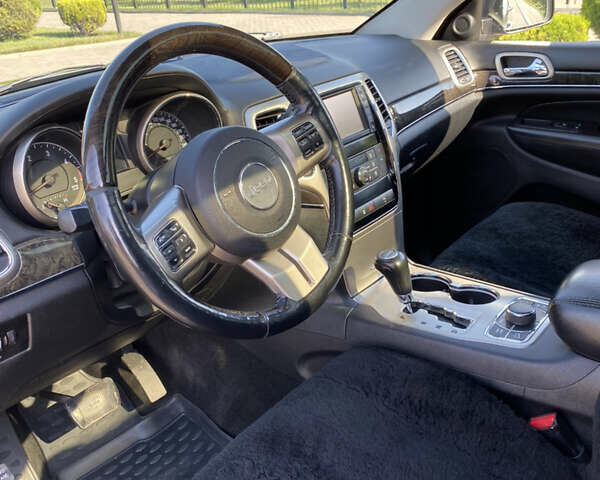 Сірий Джип Grand Cherokee, об'ємом двигуна 2.99 л та пробігом 196 тис. км за 16500 $, фото 24 на Automoto.ua