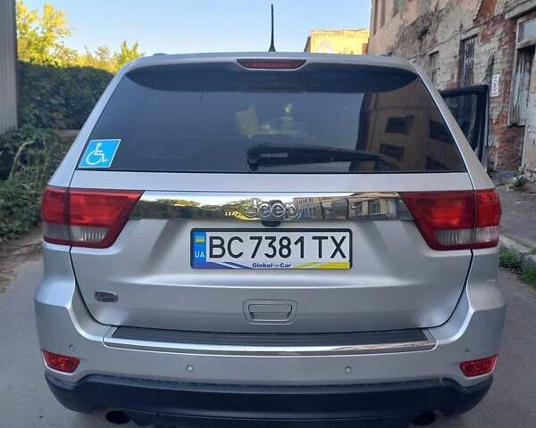 Сірий Джип Grand Cherokee, об'ємом двигуна 3 л та пробігом 207 тис. км за 13500 $, фото 2 на Automoto.ua