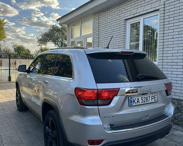 Сірий Джип Grand Cherokee, об'ємом двигуна 3 л та пробігом 196 тис. км за 15500 $, фото 7 на Automoto.ua