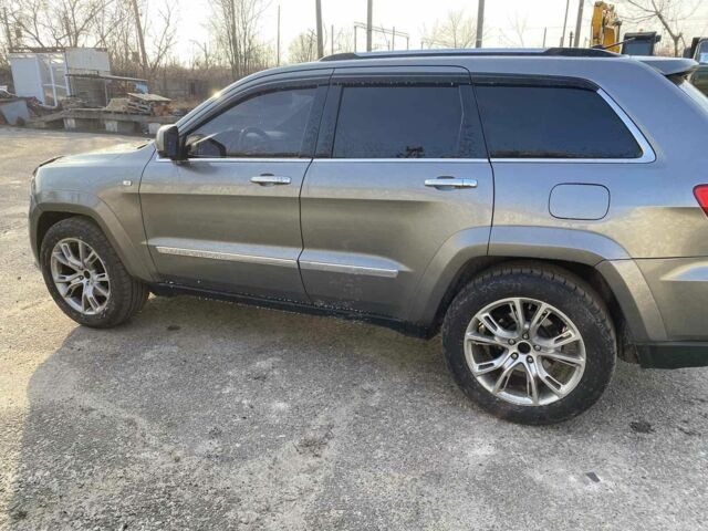 Сірий Джип Grand Cherokee, об'ємом двигуна 3 л та пробігом 198 тис. км за 17000 $, фото 3 на Automoto.ua