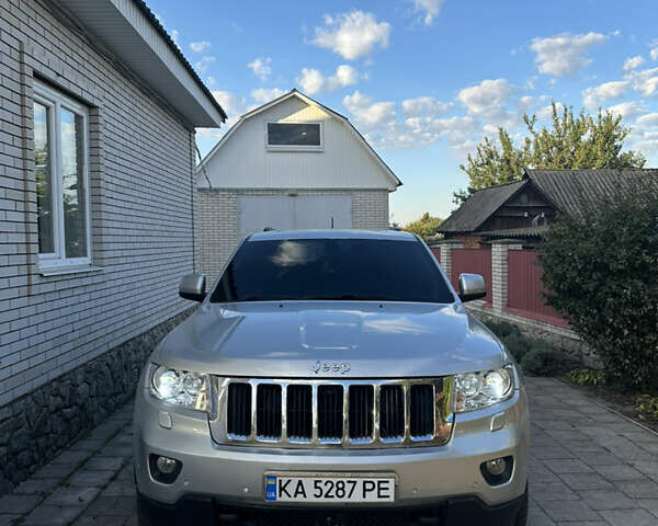 Сірий Джип Grand Cherokee, об'ємом двигуна 3 л та пробігом 196 тис. км за 15500 $, фото 1 на Automoto.ua