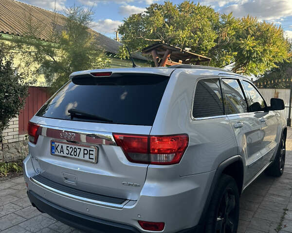 Сірий Джип Grand Cherokee, об'ємом двигуна 3 л та пробігом 196 тис. км за 15500 $, фото 5 на Automoto.ua