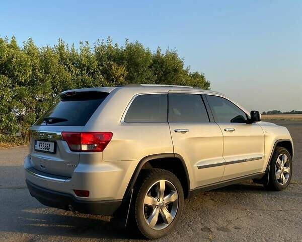 Сірий Джип Grand Cherokee, об'ємом двигуна 2.99 л та пробігом 158 тис. км за 16500 $, фото 3 на Automoto.ua