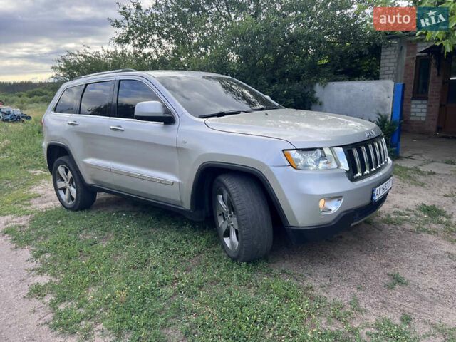 Сірий Джип Grand Cherokee, об'ємом двигуна 2.99 л та пробігом 210 тис. км за 15999 $, фото 1 на Automoto.ua