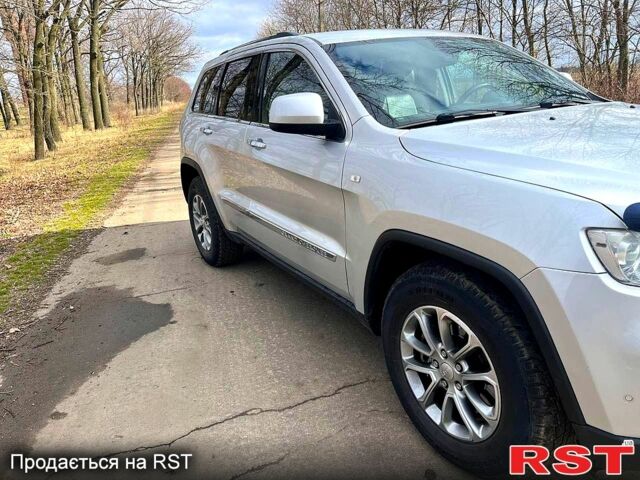 Сірий Джип Grand Cherokee, об'ємом двигуна 3 л та пробігом 0 тис. км за 19999 $, фото 2 на Automoto.ua