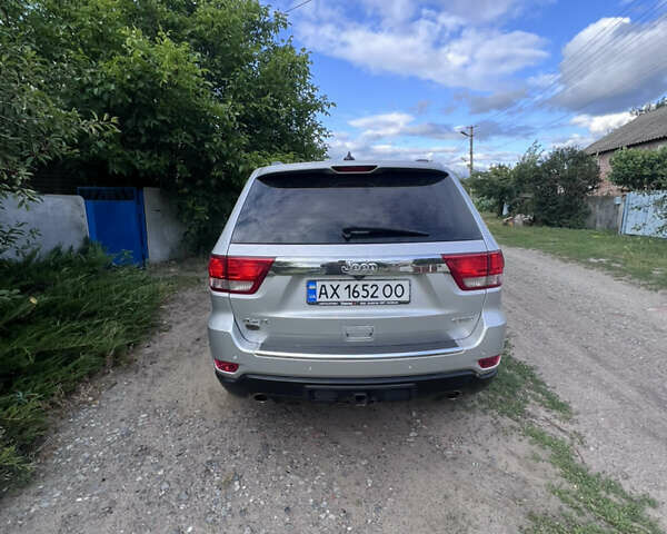 Сірий Джип Grand Cherokee, об'ємом двигуна 2.99 л та пробігом 210 тис. км за 15999 $, фото 3 на Automoto.ua