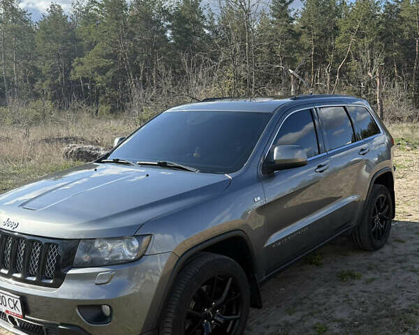 Сірий Джип Grand Cherokee, об'ємом двигуна 2.99 л та пробігом 255 тис. км за 19500 $, фото 1 на Automoto.ua
