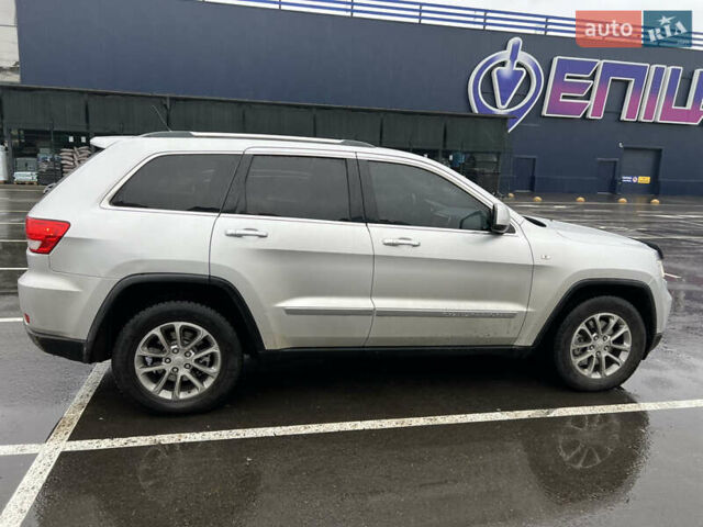 Серый Джип Гранд Чероки, объемом двигателя 2.99 л и пробегом 308 тыс. км за 15700 $, фото 2 на Automoto.ua