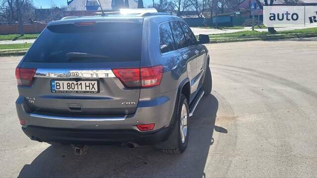 Сірий Джип Grand Cherokee, об'ємом двигуна 2.99 л та пробігом 326 тис. км за 17900 $, фото 3 на Automoto.ua