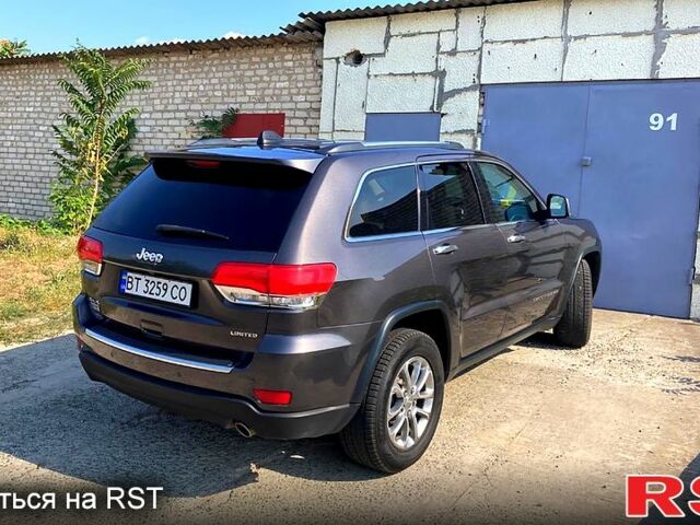 Сірий Джип Grand Cherokee, об'ємом двигуна 3.6 л та пробігом 96 тис. км за 20500 $, фото 1 на Automoto.ua