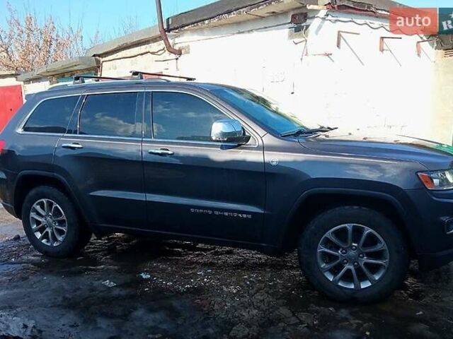 Серый Джип Гранд Чероки, объемом двигателя 3 л и пробегом 140 тыс. км за 23500 $, фото 1 на Automoto.ua
