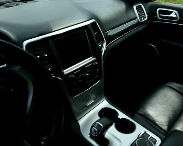 Сірий Джип Grand Cherokee, об'ємом двигуна 5.65 л та пробігом 123 тис. км за 26000 $, фото 8 на Automoto.ua