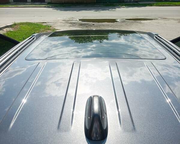 Серый Джип Гранд Чероки, объемом двигателя 3 л и пробегом 97 тыс. км за 32000 $, фото 2 на Automoto.ua