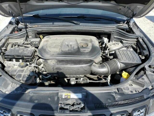 Сірий Джип Grand Cherokee, об'ємом двигуна 0.36 л та пробігом 121 тис. км за 5000 $, фото 6 на Automoto.ua