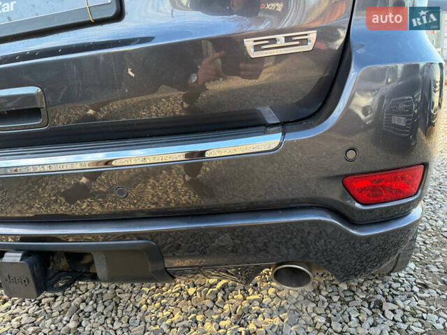 Серый Джип Гранд Чероки, объемом двигателя 5.65 л и пробегом 90 тыс. км за 25999 $, фото 67 на Automoto.ua