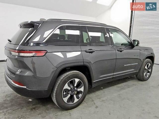 Серый Джип Гранд Чероки, объемом двигателя 2 л и пробегом 87 тыс. км за 14850 $, фото 2 на Automoto.ua