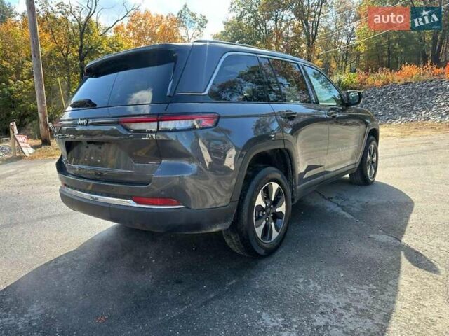 Сірий Джип Grand Cherokee, об'ємом двигуна 2 л та пробігом 66 тис. км за 15400 $, фото 2 на Automoto.ua