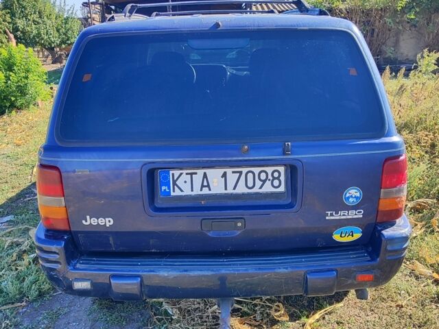 Синий Джип Гранд Чероки, объемом двигателя 2.5 л и пробегом 336 тыс. км за 2856 $, фото 4 на Automoto.ua