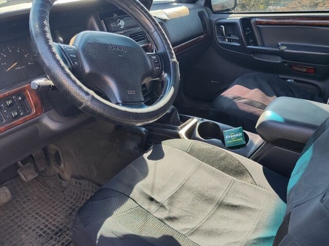 Синий Джип Гранд Чероки, объемом двигателя 2.5 л и пробегом 336 тыс. км за 2856 $, фото 6 на Automoto.ua