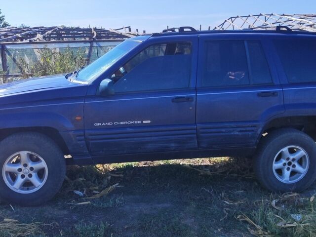 Синий Джип Гранд Чероки, объемом двигателя 2.5 л и пробегом 336 тыс. км за 2856 $, фото 3 на Automoto.ua