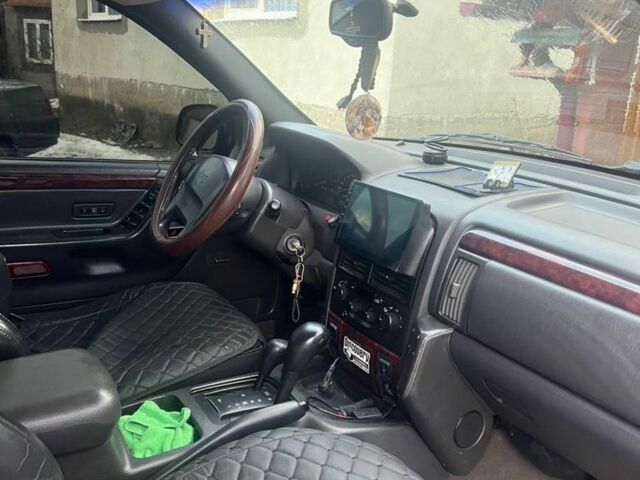 Синій Джип Grand Cherokee, об'ємом двигуна 3.1 л та пробігом 206 тис. км за 8500 $, фото 6 на Automoto.ua
