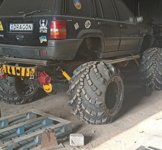 Синій Джип Grand Cherokee, об'ємом двигуна 4 л та пробігом 350 тис. км за 5500 $, фото 3 на Automoto.ua