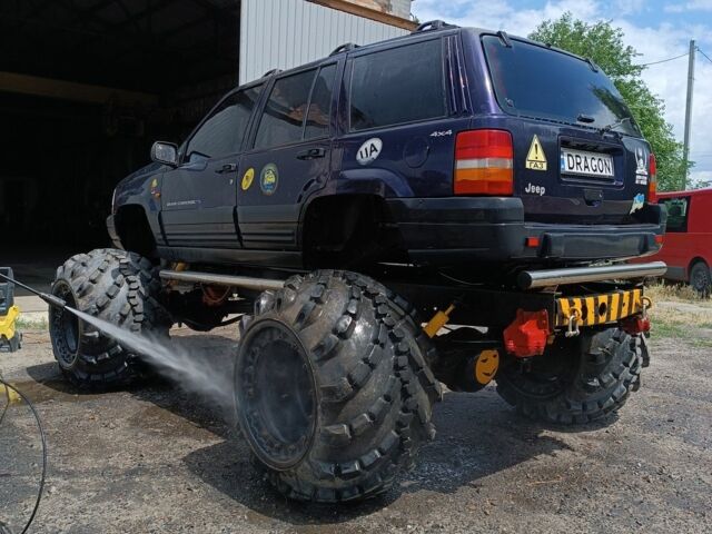 Синій Джип Grand Cherokee, об'ємом двигуна 4 л та пробігом 350 тис. км за 5500 $, фото 2 на Automoto.ua