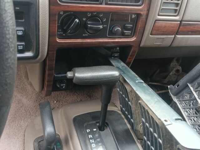 Синий Джип Гранд Чероки, объемом двигателя 4 л и пробегом 250 тыс. км за 1199 $, фото 2 на Automoto.ua