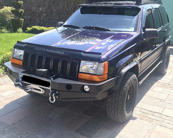 Синій Джип Grand Cherokee, об'ємом двигуна 4 л та пробігом 302 тис. км за 9500 $, фото 24 на Automoto.ua