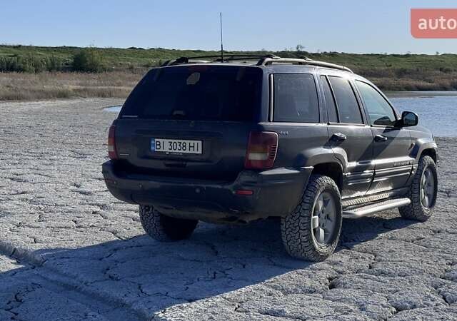 Синий Джип Гранд Чероки, объемом двигателя 3.12 л и пробегом 355 тыс. км за 7000 $, фото 5 на Automoto.ua