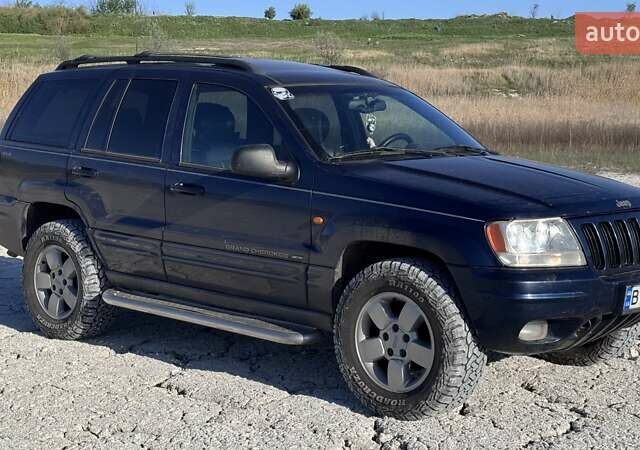 Синий Джип Гранд Чероки, объемом двигателя 3.12 л и пробегом 355 тыс. км за 7000 $, фото 1 на Automoto.ua