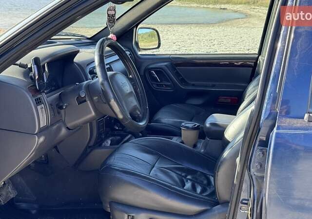 Синий Джип Гранд Чероки, объемом двигателя 3.12 л и пробегом 355 тыс. км за 7000 $, фото 10 на Automoto.ua