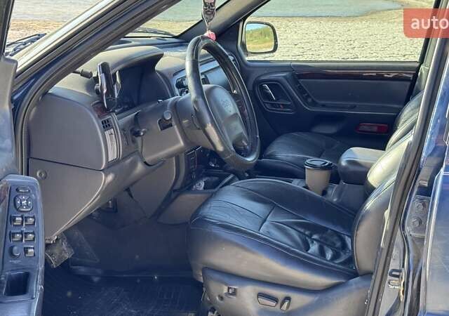 Синий Джип Гранд Чероки, объемом двигателя 3.12 л и пробегом 355 тыс. км за 7000 $, фото 9 на Automoto.ua