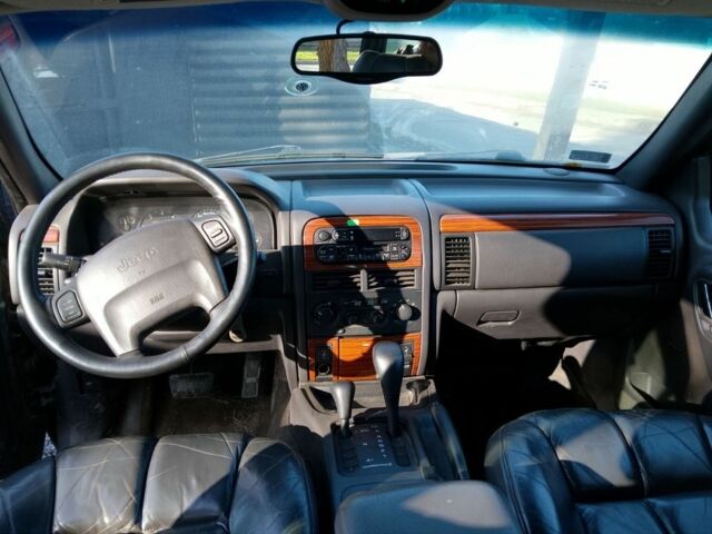 Синий Джип Гранд Чероки, объемом двигателя 0 л и пробегом 240 тыс. км за 1650 $, фото 4 на Automoto.ua