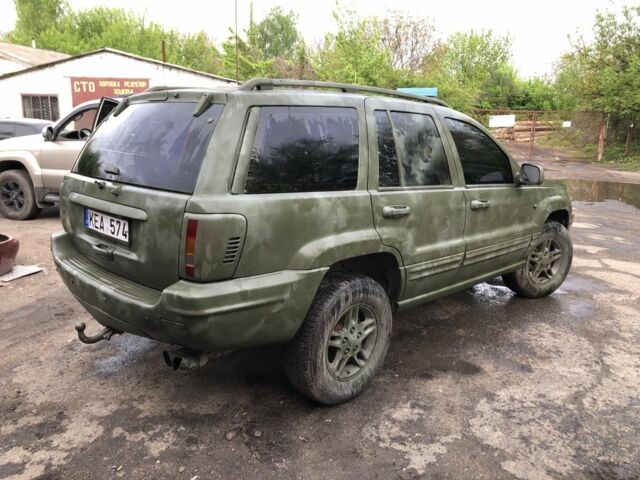 Синій Джип Grand Cherokee, об'ємом двигуна 0.31 л та пробігом 136 тис. км за 3200 $, фото 4 на Automoto.ua