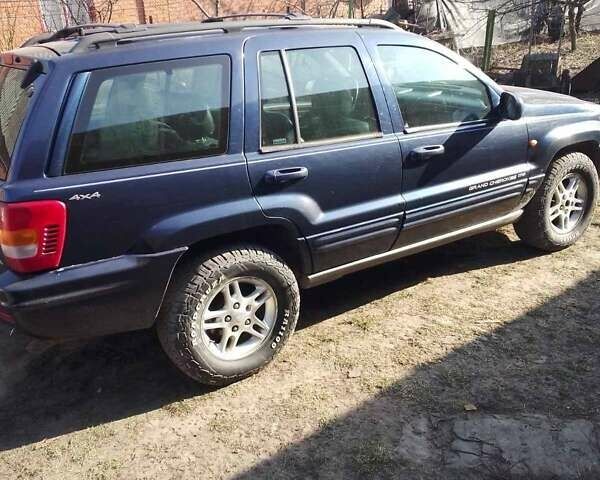 Синий Джип Гранд Чероки, объемом двигателя 4.7 л и пробегом 247 тыс. км за 7200 $, фото 1 на Automoto.ua