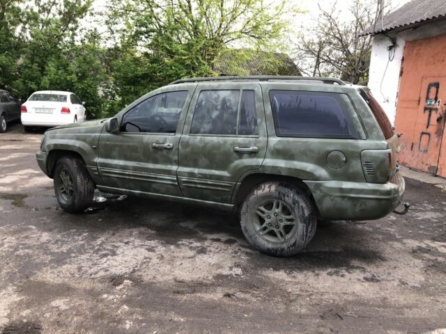 Синій Джип Grand Cherokee, об'ємом двигуна 0.31 л та пробігом 136 тис. км за 3200 $, фото 7 на Automoto.ua