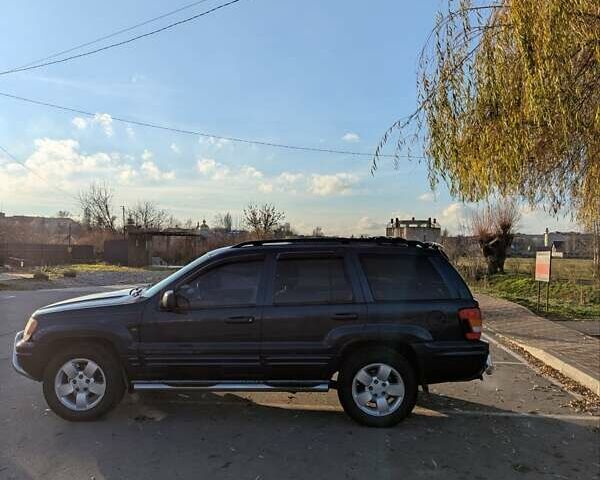 Синий Джип Гранд Чероки, объемом двигателя 4.7 л и пробегом 230 тыс. км за 6350 $, фото 3 на Automoto.ua