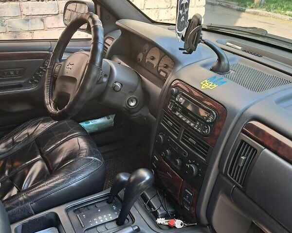 Синий Джип Гранд Чероки, объемом двигателя 3.12 л и пробегом 260 тыс. км за 7000 $, фото 9 на Automoto.ua