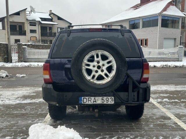 Синий Джип Гранд Чероки, объемом двигателя 3 л и пробегом 234 тыс. км за 3600 $, фото 5 на Automoto.ua