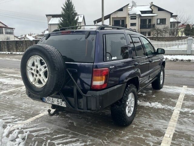 Синий Джип Гранд Чероки, объемом двигателя 3 л и пробегом 234 тыс. км за 3600 $, фото 4 на Automoto.ua