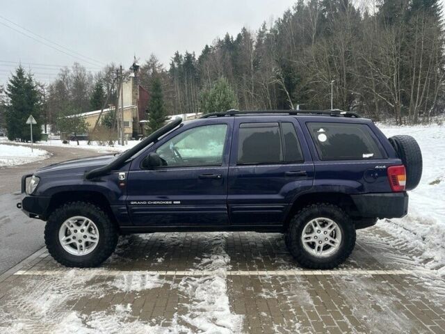 Синий Джип Гранд Чероки, объемом двигателя 3 л и пробегом 234 тыс. км за 3600 $, фото 1 на Automoto.ua
