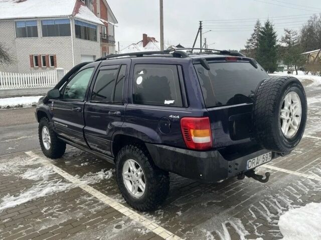 Синий Джип Гранд Чероки, объемом двигателя 3 л и пробегом 234 тыс. км за 3600 $, фото 2 на Automoto.ua