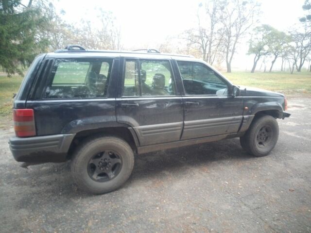 Синий Джип Гранд Чероки, объемом двигателя 2.5 л и пробегом 320 тыс. км за 2300 $, фото 2 на Automoto.ua