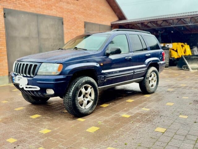 Джип Grand Cherokee 2002 у Харкові на Automoto.ua Синій Джип Grand Cherokee, об'ємом двигуна 0 л та пробігом 320 тис. км за 2500 $, фото 4 на Automoto.ua
