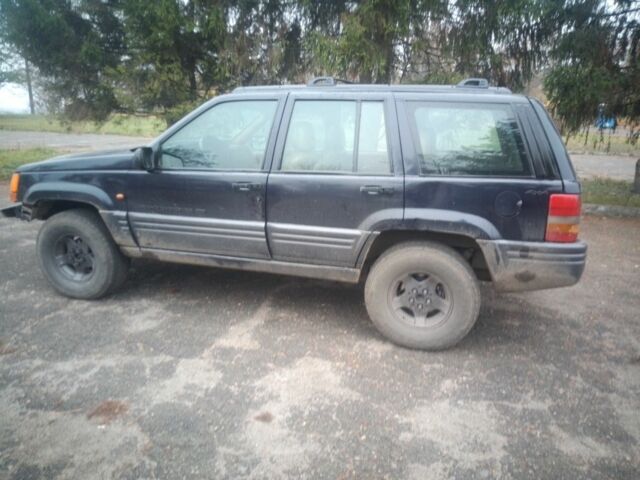 Синий Джип Гранд Чероки, объемом двигателя 2.5 л и пробегом 320 тыс. км за 2300 $, фото 1 на Automoto.ua